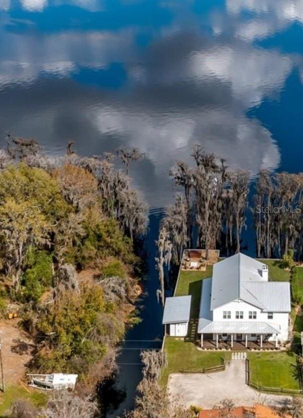 12117 Cypress Ln, Clermont, FL 34711 - aerial view of property and surrounding area featuring a nearby body of water