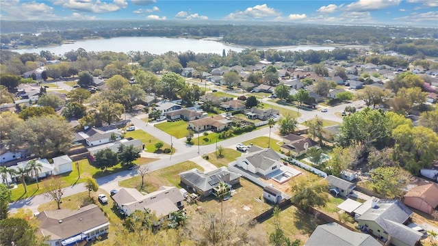 aerial view with a residential view and a water view