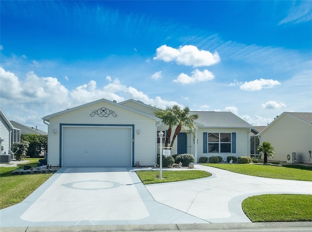 ranch-style home with a garage, a front yard, and driveway