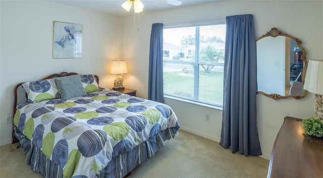 carpeted bedroom with baseboards