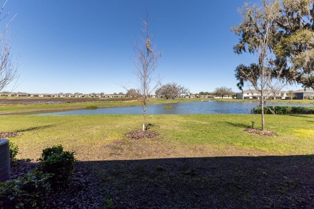 view of yard with a water view