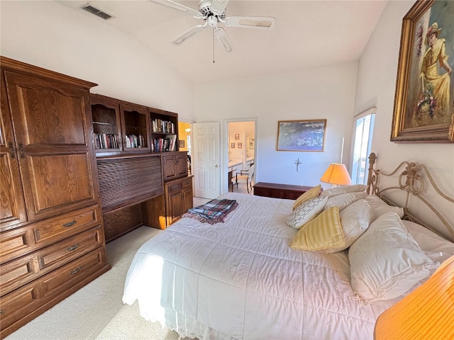 bedroom with lofted ceiling, ceiling fan, connected bathroom, carpet floors, and visible vents