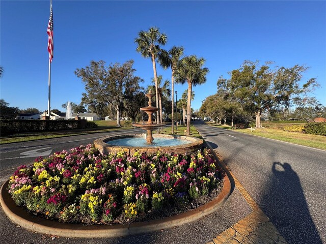 view of street featuring curbs