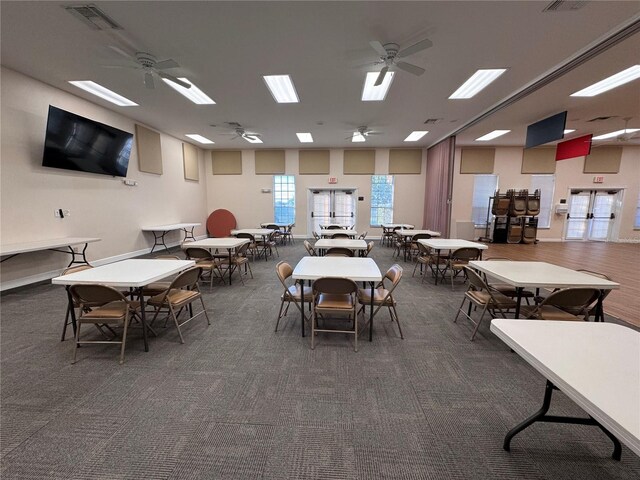 dining area with a ceiling fan and visible vents