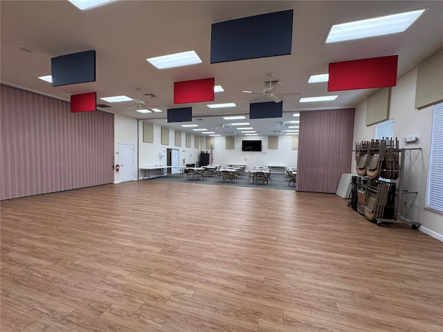 interior space featuring ceiling fan and wood finished floors