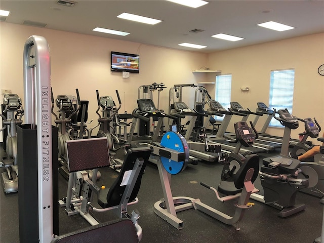 workout area featuring visible vents