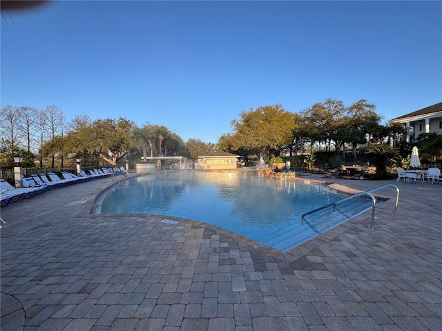 pool with a patio area