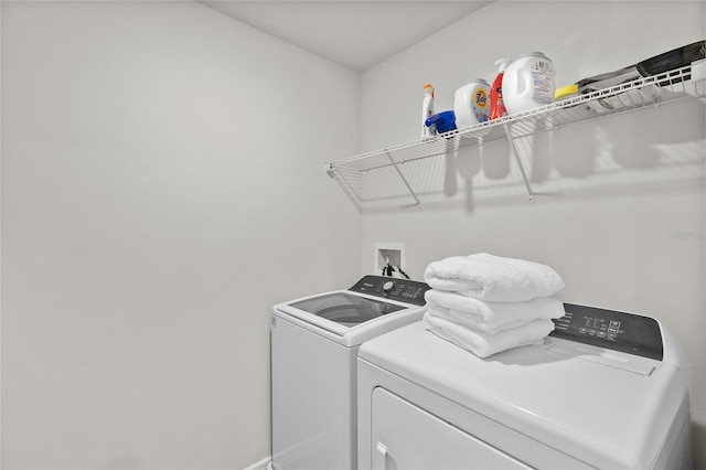 washroom with laundry area and washing machine and clothes dryer