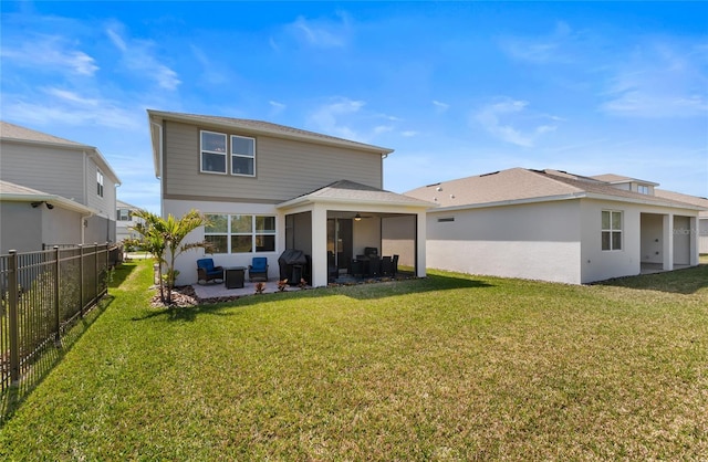 back of property featuring a patio, a lawn, and fence private yard