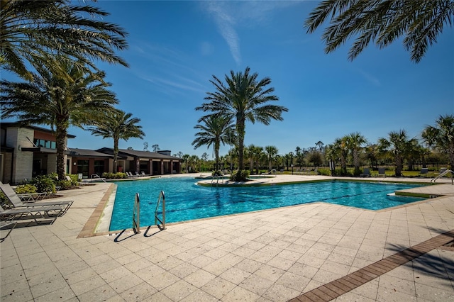 community pool featuring a patio