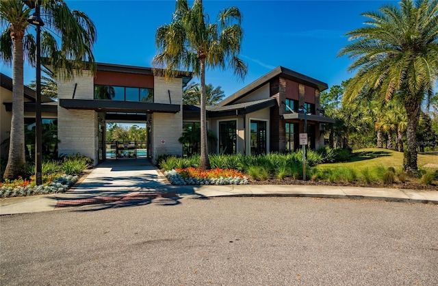 view of building exterior with driveway