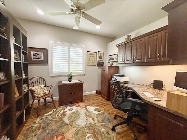 office with recessed lighting, a ceiling fan, baseboards, built in study area, and light wood finished floors