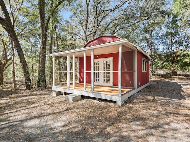 view of outbuilding with french doors