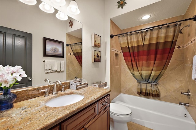 bathroom featuring vanity, toilet, and shower / tub combo with curtain