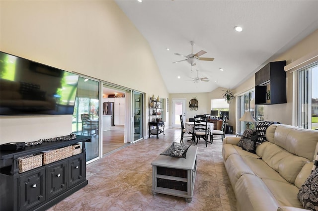 living area featuring recessed lighting, high vaulted ceiling, and ceiling fan