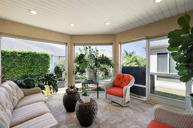 sunroom / solarium with wooden ceiling and a wealth of natural light