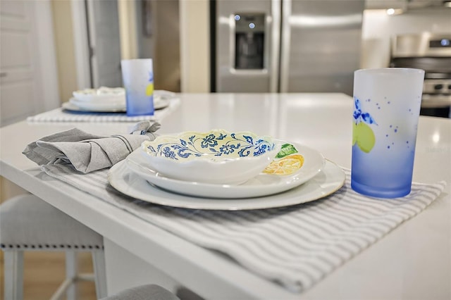 room details featuring stainless steel fridge