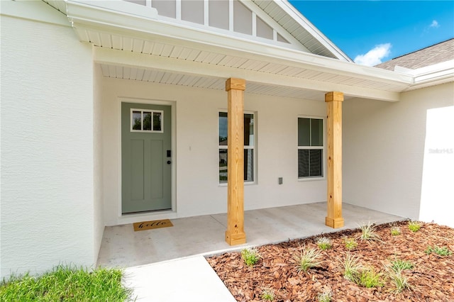 13334 SW 107th St, Dunnellon, FL 34432 - doorway to property with stucco siding