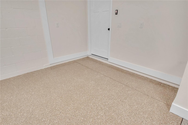 13334 SW 107th St, Dunnellon, FL 34432 - empty room with baseboards and speckled floor