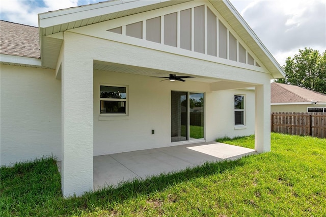13334 SW 107th St, Dunnellon, FL 34432 - back of house with a ceiling fan, stucco siding, and a patio area
