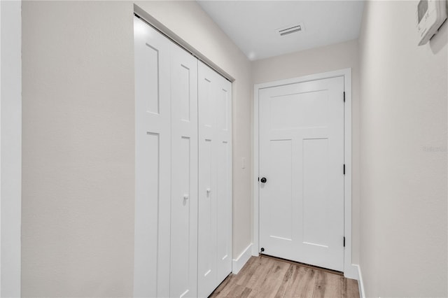 13334 SW 107th St, Dunnellon, FL 34432 - corridor with light wood-style floors and baseboards