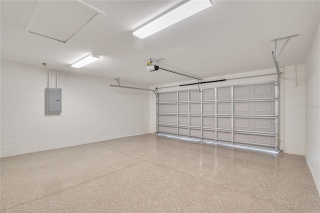 13334 SW 107th St, Dunnellon, FL 34432 - garage featuring electric panel, concrete block wall, and a garage door opener