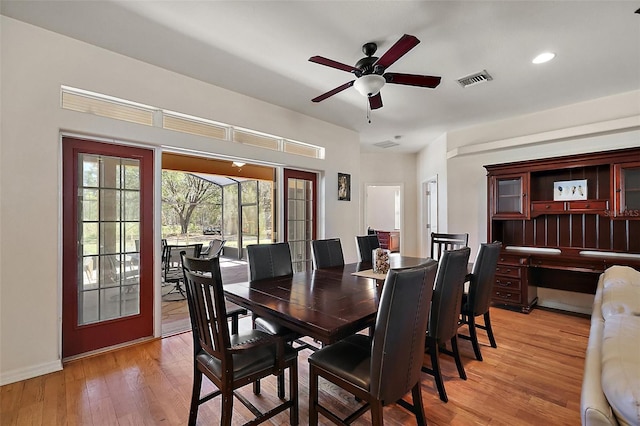 dining room featuring recessed lighting, visible vents, a ceiling fan, light wood-type flooring, and baseboards