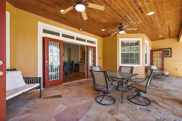 view of patio featuring ceiling fan and outdoor dining area