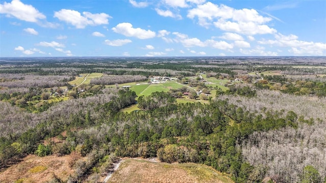 drone / aerial view with a view of trees