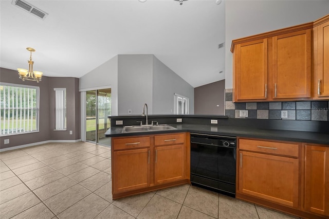 kitchen featuring dark countertops, visible vents, black dishwasher, brown cabinets, and a sink
