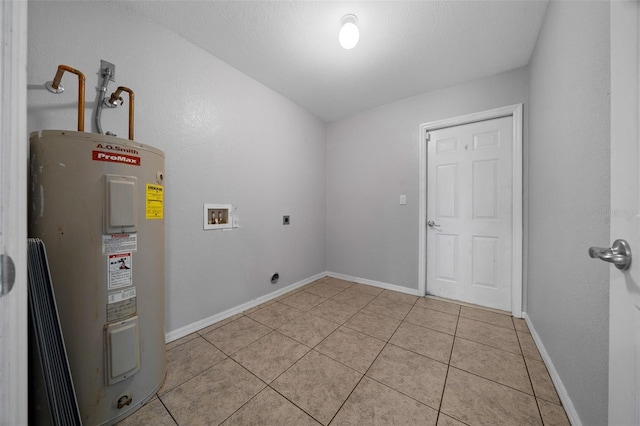 clothes washing area featuring electric water heater, light tile patterned flooring, hookup for an electric dryer, hookup for a washing machine, and laundry area
