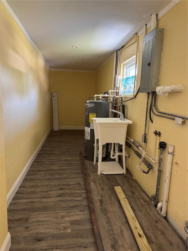 corridor with crown molding, electric panel, wood finished floors, and electric water heater