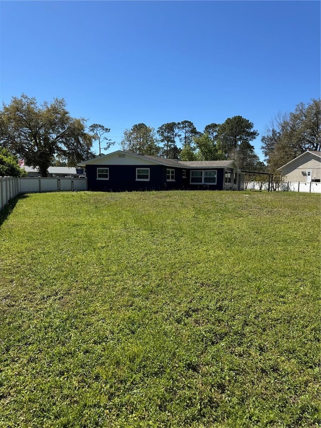 view of yard featuring fence