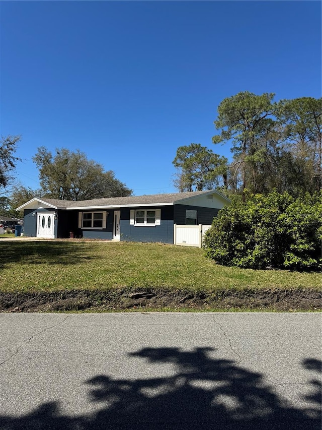 view of front of home with a front lawn