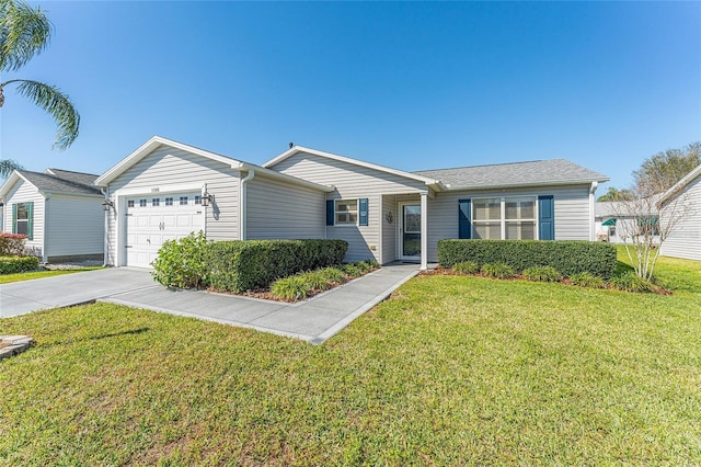 ranch-style house with a front yard, an attached garage, and driveway