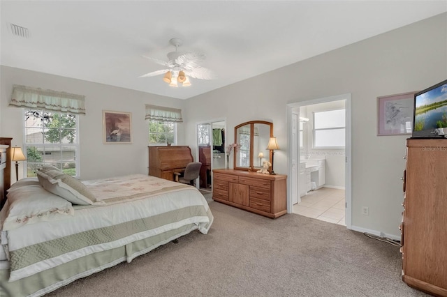 bedroom with baseboards, visible vents, ceiling fan, tile patterned flooring, and carpet floors