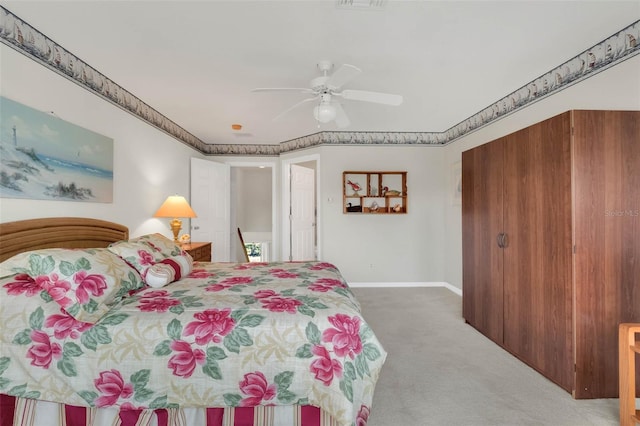 bedroom with visible vents, carpet floors, a ceiling fan, and baseboards