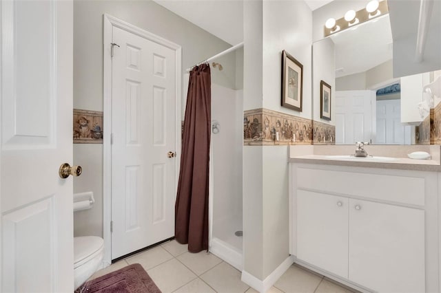 full bath with toilet, a stall shower, and tile patterned floors