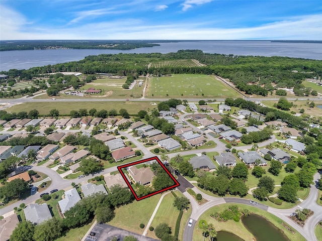 aerial view with a residential view and a water view