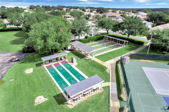 birds eye view of property with a residential view