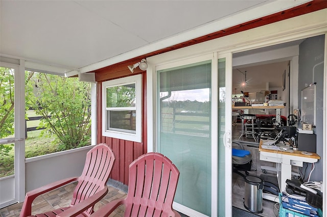 balcony featuring a sunroom