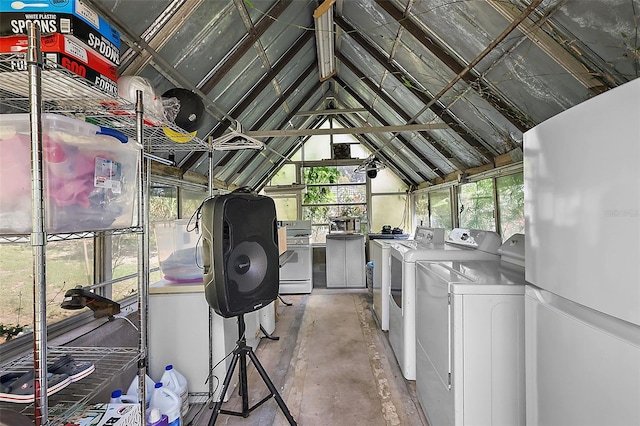 clothes washing area with washer and dryer and laundry area