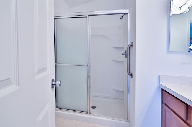 full bath featuring a shower stall and vanity