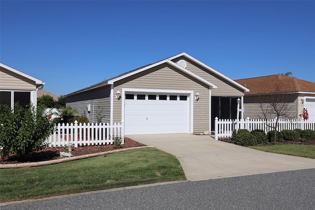 view of front facade featuring a garage, fence, and concrete driveway