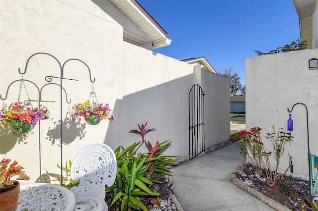 exterior space featuring stucco siding