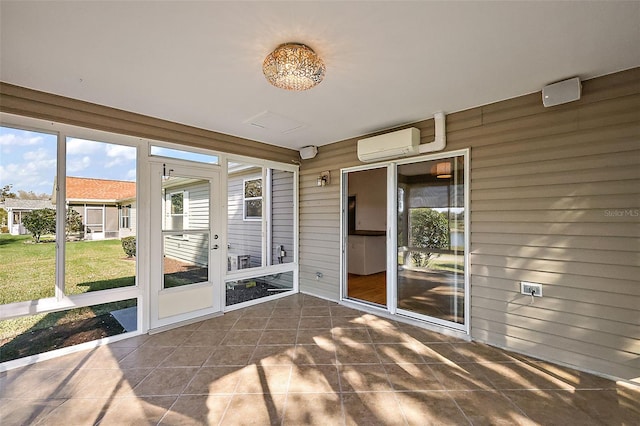 sunroom / solarium featuring a wall mounted AC