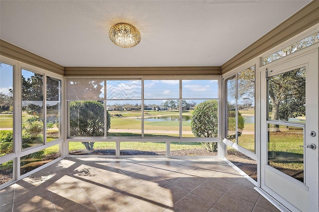 776 Alcott Ave, The Villages, FL 32162 - unfurnished sunroom featuring a water view