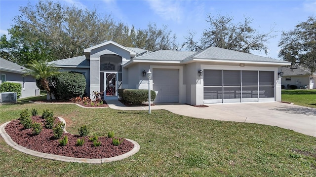 single story home with cooling unit, a garage, driveway, stucco siding, and a front yard