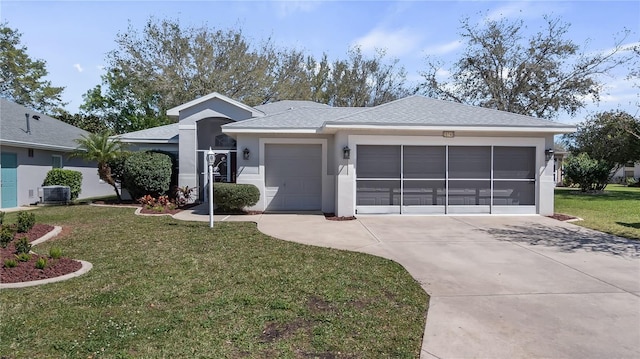 view of front facade featuring an attached garage, concrete driveway, roof with shingles, stucco siding, and a front lawn