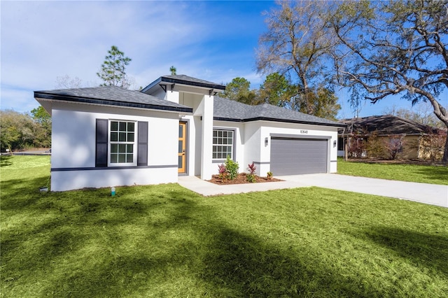 ranch-style house with roof with shingles, stucco siding, a front yard, a garage, and driveway